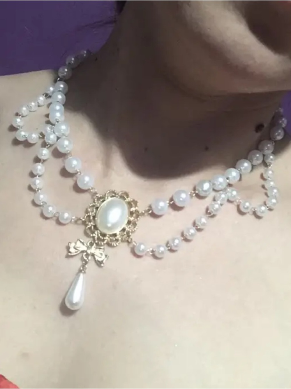 Pearl Double-Strand Necklace with Gold Bow Pendant
